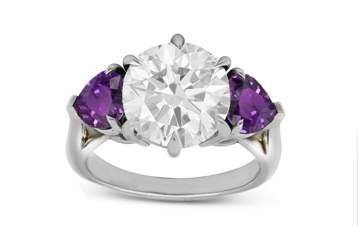 78 custom made unique round diamond and heart purple sapphire side  three stone engagement ring