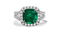 8 custom made emerald and diamond vintage halo engagement rings