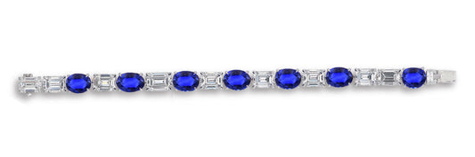 8 custom unique alternating oval blue sapphire and baguette diamond tennis bracelet