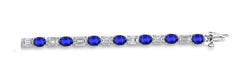 8 custom unique alternating oval blue sapphire and baguette diamond tennis bracelet