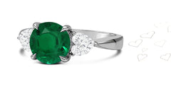 80 custom made unique round emerald and heart diamonde side three stone engagement ring