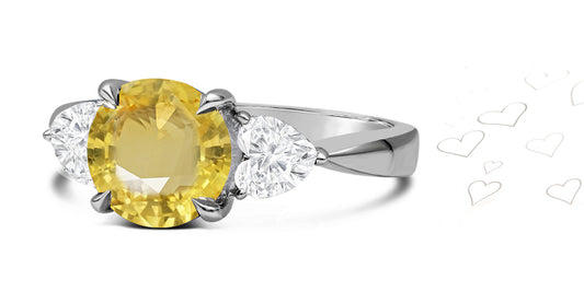 80 custom made unique round yellow sapphire and heart diamonde side three stone engagement ring