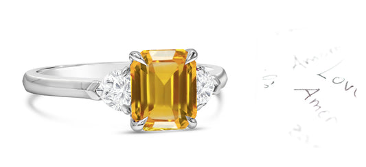 82 custom made unique emerald cut yellow sapphire and heart diamond side three stone engagement ring