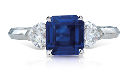 9 custom made unique asscher cut blue sapphire center stone with heart diamond accents three stone engagement ring