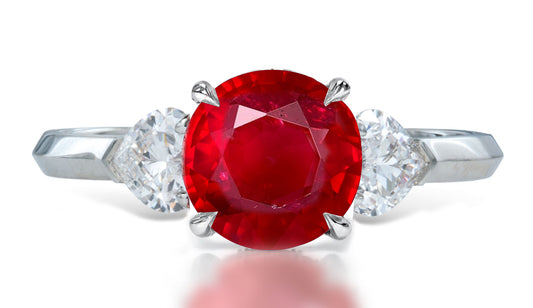 9 custom made unique round ruby center stone with heart diamond accents three stone engagement ring