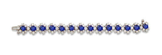 9 custom unique alternating round blue sapphire and round diamond halo tennis bracelet