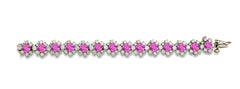 9 custom unique alternating round pink sapphire and round diamond halo tennis bracelet