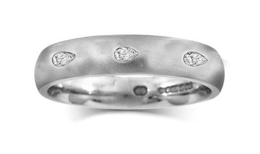 stackable eternity band burnish set with pear shaped diamonds