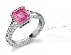 engagement ring with emerald cut pink sapphire center and diamond accents band