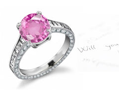 engagement ring with round pink sapphire center and diamond accents band