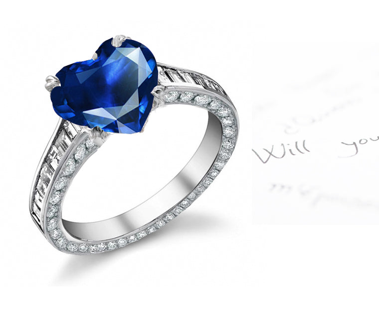 engagement ring with heart blue sapphire center and diamond accents band