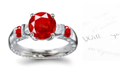 engagement ring five stone with round ruby center and side with rubies and diamonds