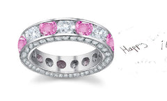 eternity ring with alternating round pink sapphires and diamonds