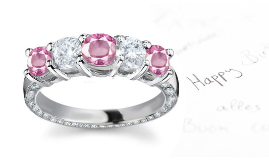 anniversary ring with alternating five round pink sapphires and diamonds