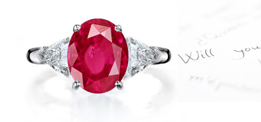 engagement ring three stone with oval ruby and side trillion diamonds