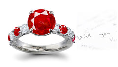 engagement ring handcrafted with alternating round rubies and diamonds