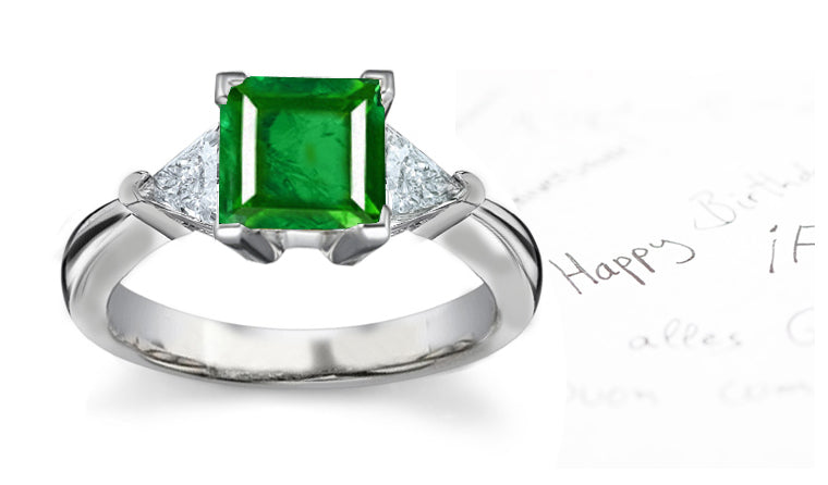 engagement ring three stone with square emerald center and side trillion diamonds