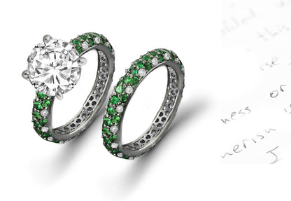 bridal set with round diamond center and pave set emerald band