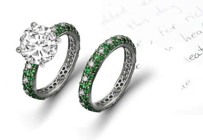 bridal set with round diamond center and pave set emerald band