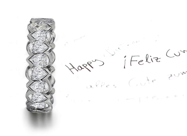 stackable eternity ring bezel set with pear shape diamonds