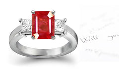 engagement ring handcrafted with emerald cut ruby center and side square diamonds