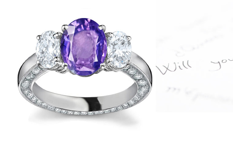 engagement ring three stone with oval purple sapphire center and side oval diamonds