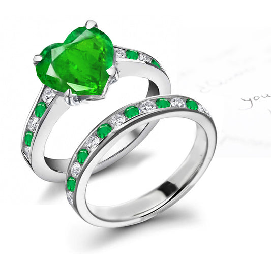 bridal set handcrafted with heart emerald center and band with alternating round emeralds and diamonds