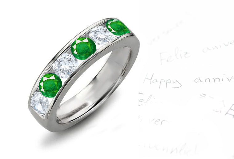 Anniversary ring with alternating 6 round emeralds and diamonds