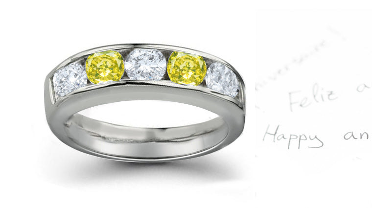 Anniversary ring with alternating 5 round yellow and white diamonds