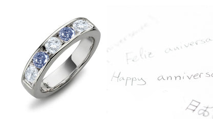 Anniversary ring with alternating with fancy blue and white diamonds