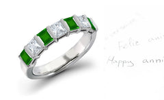 anniversary ring bar set with square emeralds and diamonds