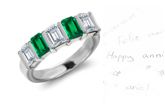 anniversary ring bar set with five emerald cut emeralds and diamonds