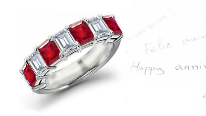 anniversary ring bar set with five emerald cut rubies and diamonds