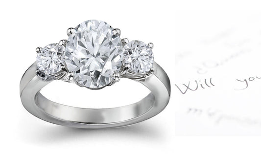 engagement ring with oval diamond center and side round diamonds