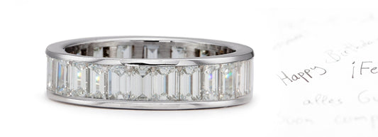 eternity band channel set with emerald cut diamonds