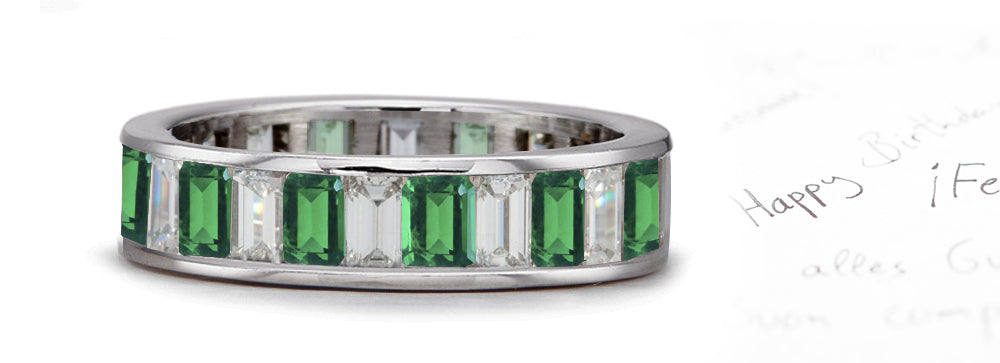 eternity ring handcrafted with channel set emerald cut emeralds and diamonds