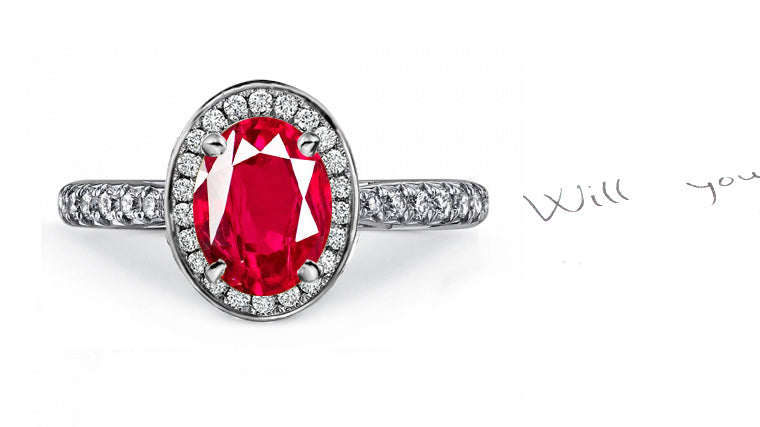 engagement ring handcrafted with oval ruby center and diamond halo/band