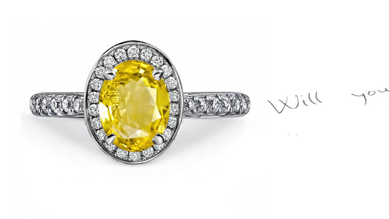 engagement ring handcrafted with oval yellow sapphire center and diamond halo/band