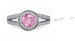 engagement ring handcrafted with round pink sapphire center and diamond halo/band