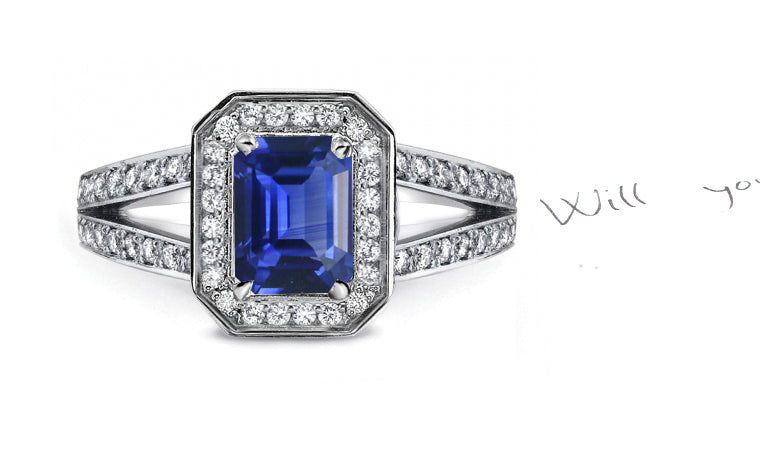 engagement ring handcrafted with emerald cut blue sapphire center and diamond halo/band