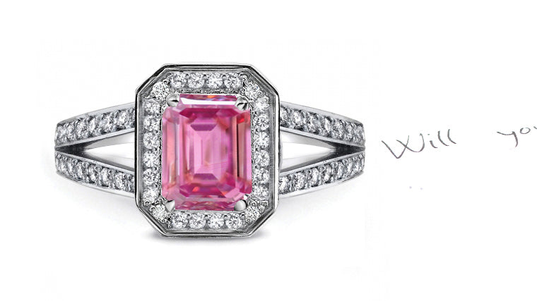 engagement ring handcrafted with emerald cut pink sapphire center and diamond halo/band