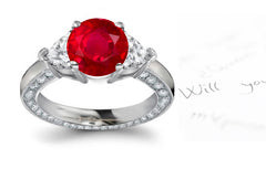 engagement ring handcrafted with round ruby center side diamond accents band