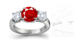 engagement ring three stone with round ruby and side round diamonds