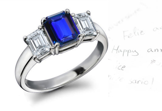 engagement ring three stone with emerald cut blue sapphire and side diamonds