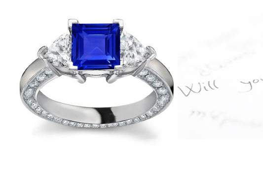 engagement ring with square blue sapphire center and diamond accents band