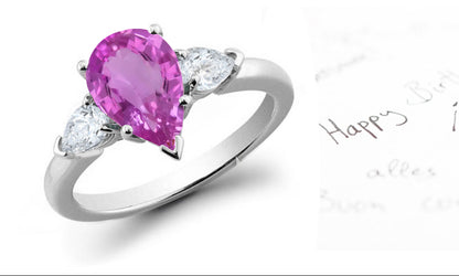 engagement ring with pear pink sapphire center and site pear white diamonds