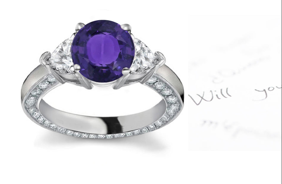 engagement ring with round purple sapphire center and heart/round diamond accents band