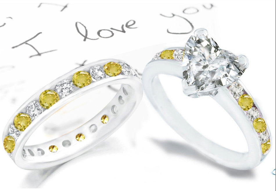 bridal set with heart diamond center and side round yellow sapphires and diamonds