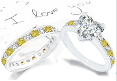 bridal set with heart diamond center and side round yellow sapphires and diamonds