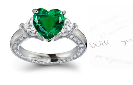 engagement rings with heart emerald and side heart diamonds